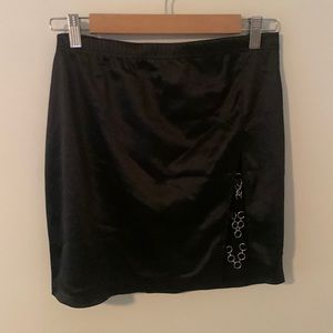 black skirt with a chain slit
